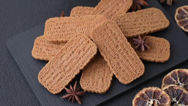 Caramel biscuit cookies, or shortbread, are a healthy breakfast staple. Biscuit cookies as a food background for your design