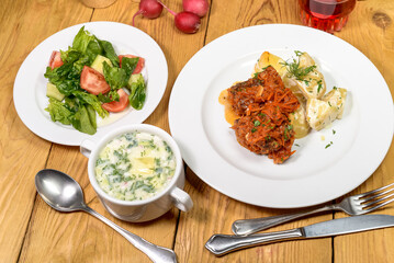 Complete Dinner Setting Fish, Creamy Soup, and Fresh Salad