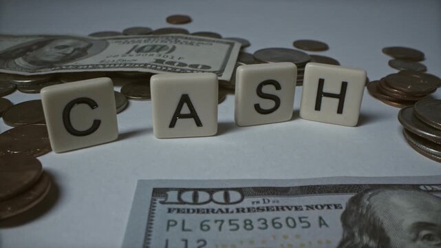 Cash Concept with US Dollar Bills and Coins