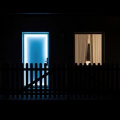 Fototapeta premium Glowing Door and Window in Darkness.