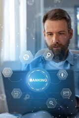 Man using laptop for banking invoice payment at home in the afternoon