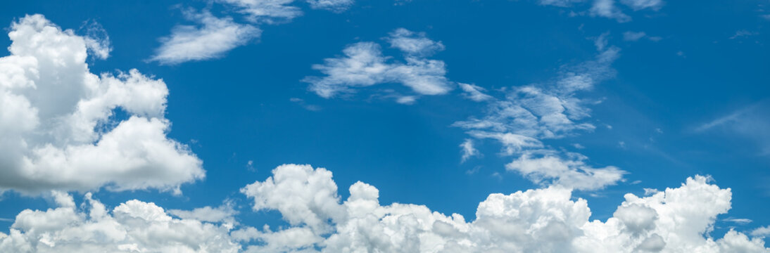 Panoramic beautiful white clouds with blue sky. Nature background.