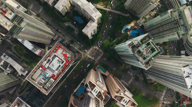 Sunset drone view, Bonifacio Global City streets, lights, modern skyline