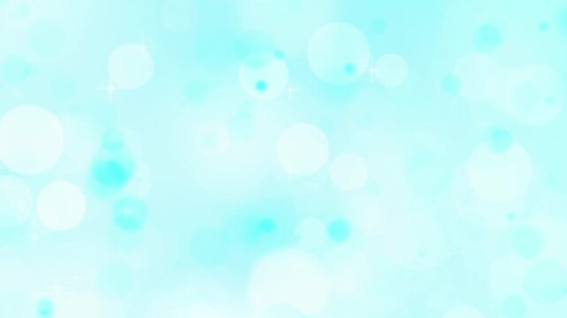 水色　玉ボケ　ループ動画　抽象的　ふわふわ　爽やか　キラキラ　シンプル　パーティクル　Light blue bokeh lights.Abstract soft glowing light.Loop video.