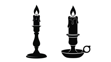 Two black candles with flames a striking silhouette