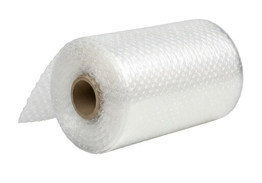 Roll of clear plastic wrap sitting on a flat surface