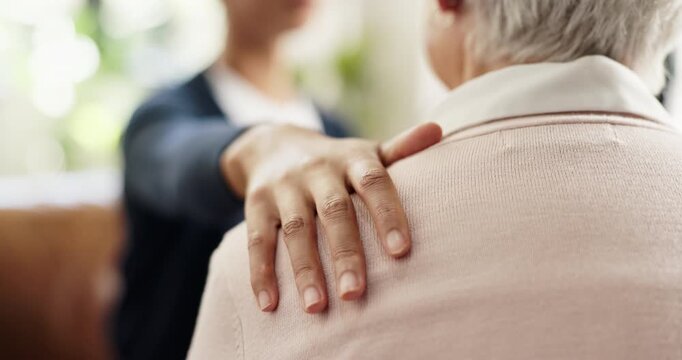 Caregiver, shoulder touch or hands in house with comfort, understanding or empathy in retirement care. Compassion, security or elderly person in home with help, support and trust in assisted living.