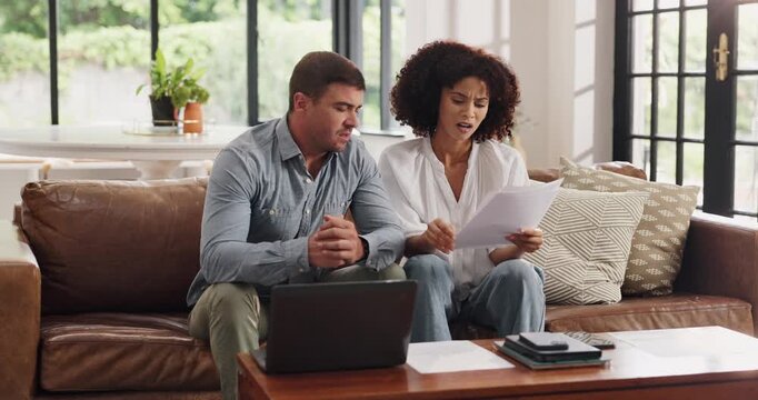 Documents, finance and laptop with confused couple on sofa for budget or investment analysis. Computer, paperwork and problem solving with people in home living room for financial review or solution