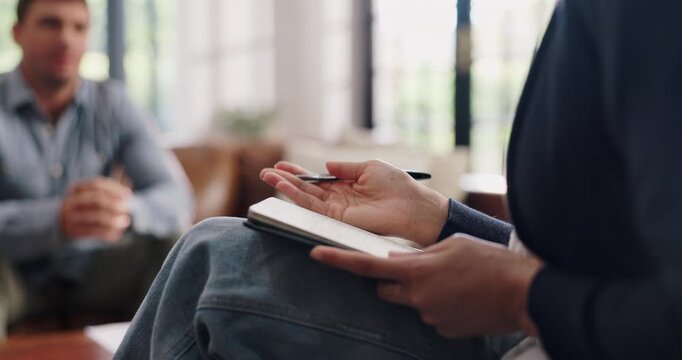 Hands, notebook and talk with psychologist for counseling, stress or mental health assessment. Therapist, client and consulting with notes for support, help or listen to person with anxiety in office