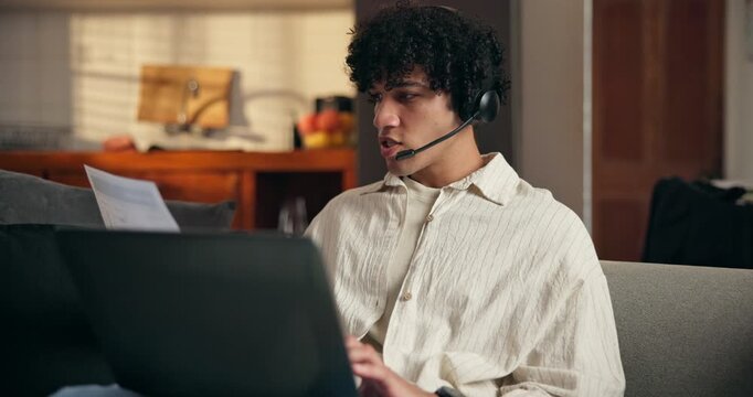 Businessman, consultant and remote work with headset on laptop for finance advice or help in home. Man, financial advisor or freelance agent with documents or mic on computer for customer service