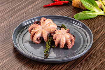 Gourmet Boiled octopus in the bowl © Andrei Starostin