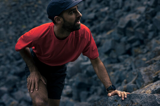 Male Athlete on Dramatic Rocky Terrain