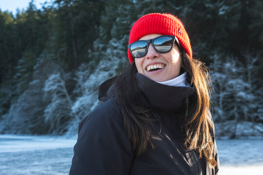 People Skating on Frozen Lake in Winter