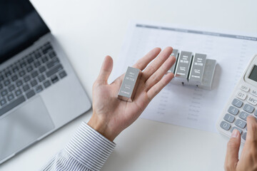 Silver bar Trading business man hand offering silver&nbsp;Investment financial report Trading Pure silver precious metals investment&nbsp; on the stock exchange&nbsp;Rising prices.