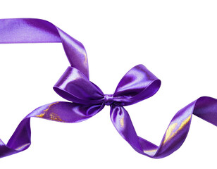 Elegant purple satin ribbon bow against a stark black background