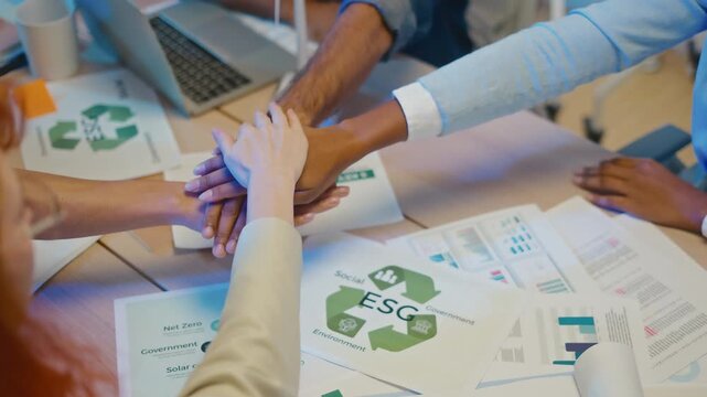 ESG,empathy,partnership and Social connection.Business people join hands together for CSR,corporate social responsibility.World environment day.Global community teamwork.Charity,volunteer, partnership
