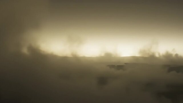 Cattle grazing in a misty, diffused dawn light on the horizon of a rural farm landscape