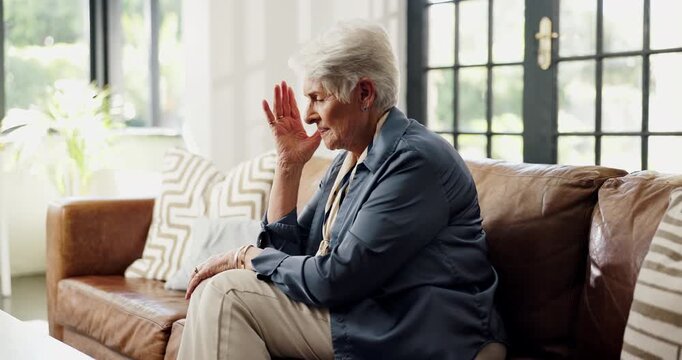 Mental health, thinking or old woman on sofa with worry, mistake or memory of past trauma in living room. Reflection, anxiety or elderly person in house with fear, regret or stress in retirement.