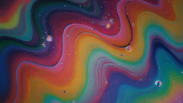 Vibrant red plasma liquid swirl abstract macro seamless loop background