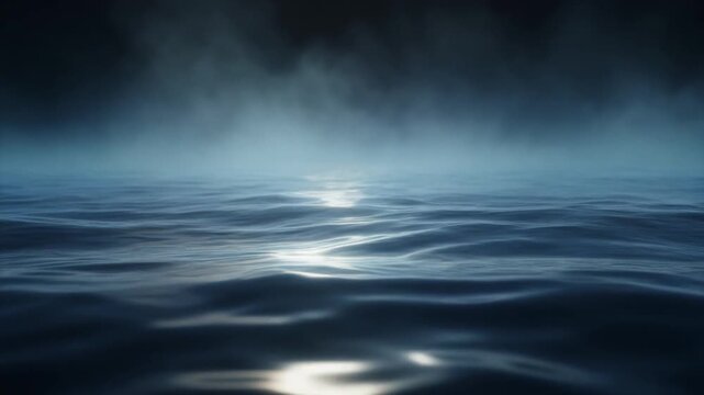 Cinematic misty ocean surface with soft light reflections seamless loop background