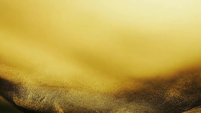 Golden amorphous light diffusing into deep dark, creating a soft glowing gradient texture and ethereal, tranquil atmosphere perfect for serene backgrounds and design