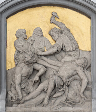 BAD REICHENHALL, GERMANY - SEPTEMBER 8, 2025: The stone relief of Jusus is nailed to the cross in the church St. &Auml;gidien by unknown baroque artist from year 1733. 