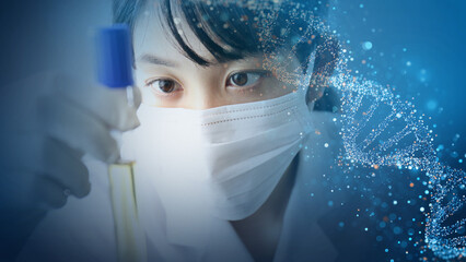 試験管を見つめる女性研究員｜最先端医学と診断技術のイメージ