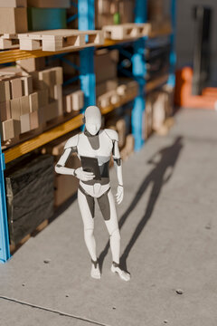 3D Robot Inventory Tablet, warehouse aisle checks boxed stock