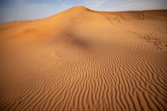 Rippled sand dunes in Rub al Khali desert 
