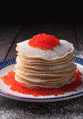 Pancakes with red caviar