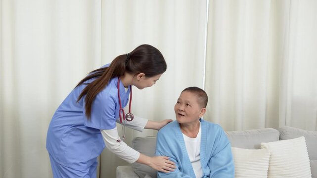 Woman, doctor and blood pressure machine in elderly care for heart beat, monitoring or healthcare at home. Female nurse or medical caregiver checking senior patient bpm or results at house