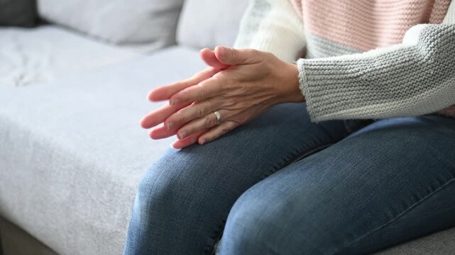 Close up of nervous woman moving her hands in anxiety