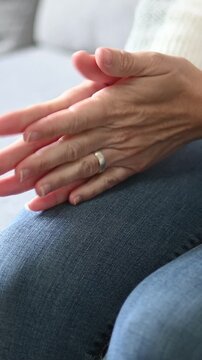 Close up of nervous woman moving her hands in anxiety