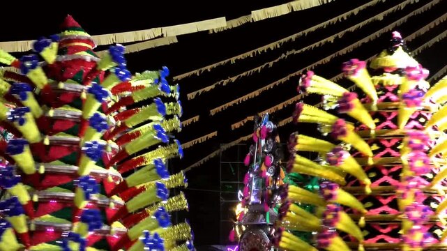 Colorful spinning structures used in the 'Kavadi' procession of temple festivals in Kerala, India
