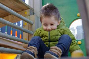 Boy playing on playground