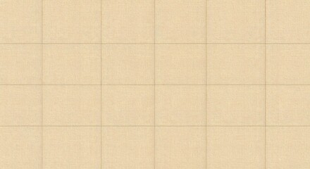 Intricate gold embroidery on a beige fabric background showcasing detailed patterns