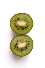 Fresh Kiwi Fruit Sliced in Half Isolated on White Background