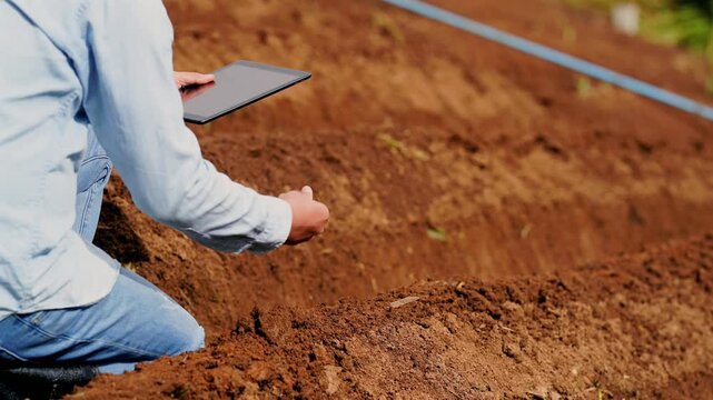 Digital farmer agriculture tablet soil field technology rural crop inspection modern precision farming smart agronomy research analysis monitoring outdoor data planting planning checking agriculture