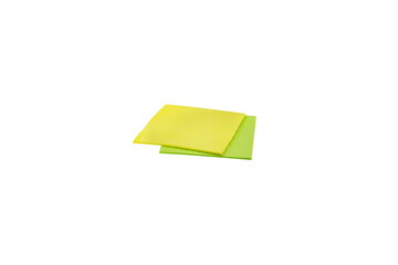 Yellow and green kitchen cleaning sponge cloths isolated on transparent background PNG