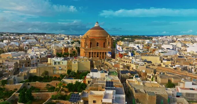 Aerial view of Mosta Church, famous remarkable wartime miracle, architectural landmarks, Malta 