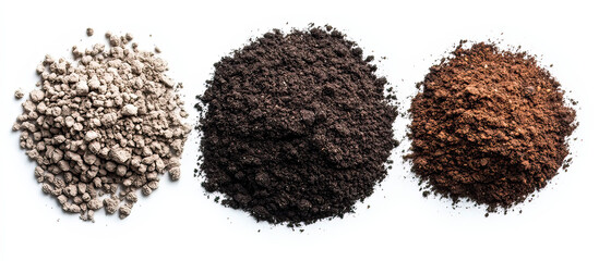 Three piles of different textured soil and ground materials