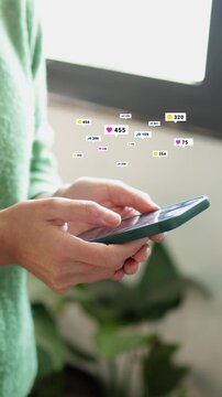 Person holding smartphone, interacting with social media, receiving numerous likes, comments, and notifications, illustrating digital engagement, online influence, and connectivity