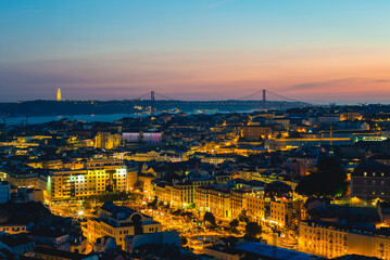 Naklejka premium Lisbon at night, the capital of Portugal by river Tagus