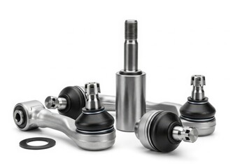 Assorted car suspension parts and components arranged on a white background