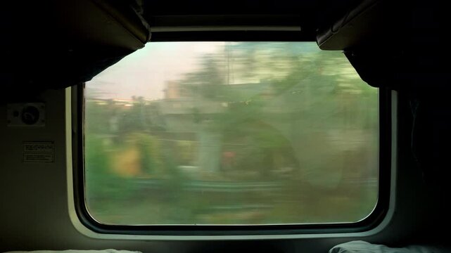 Two Men Looking Out Train Window in India, Friends Traveling on Indian Railways, Cinematic Journey POV