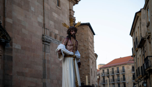 Statue of Jesus in a historical urban setting.. "Jesus of the Flagellation" or "The Flagellated", from the Brotherhood of the Vera Cruz. Salamanca, Spain