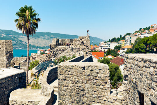 Stone walls and towers of Kanli Kula - 16th century monument of Ottoman fortification architecture. Herceg Novi, Montenegro