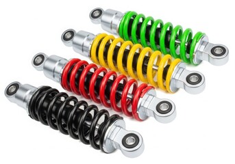 Set of colorful motorcycle rear shocks with chrome ends on a white background