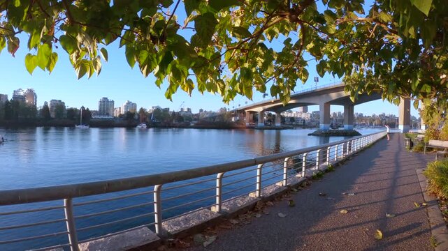 Cambie Bridge False Creek Dawn Vancouver 4K UHD.A dolly shot looking out over False Creek and the Cambie Bridge in the morning. Vancouver, British Columbia.
