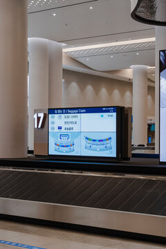 January 25, 2026, Incheon, South Korea - Digital baggage claim display and carousel at Incheon International Airport Terminal 2.
